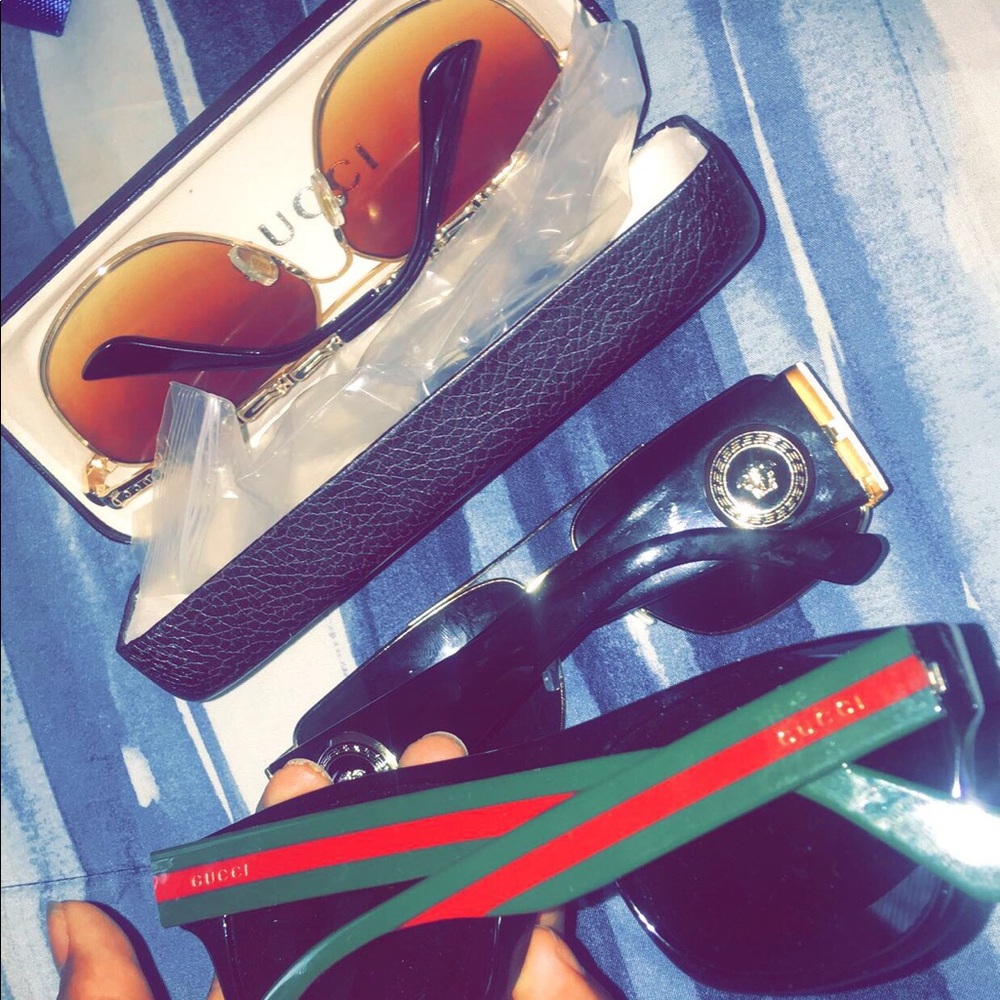 2 Gucci glasses and 1 Versace